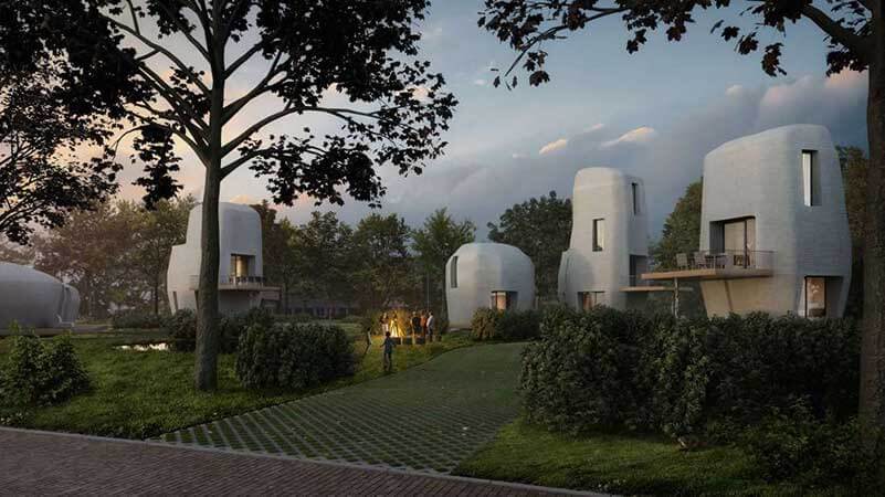 Drie futuristische witte ronde woningen