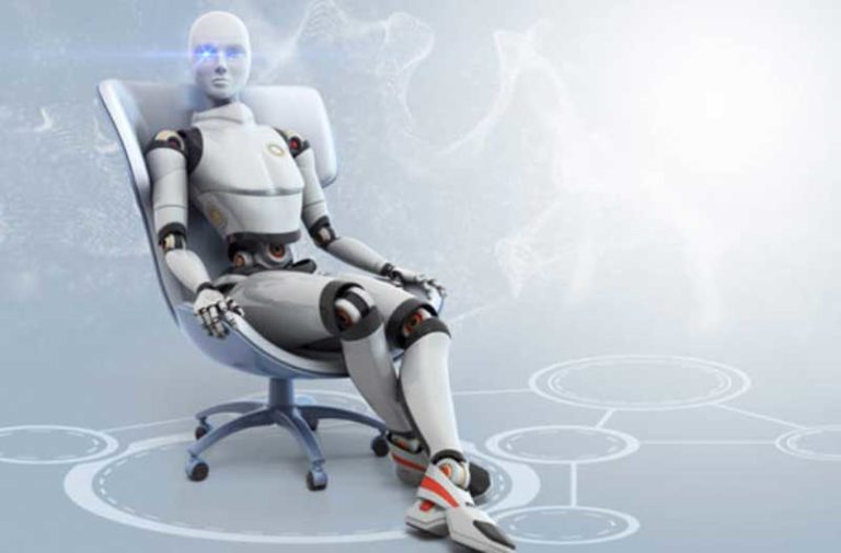 Witte robot zit in bureaustoel