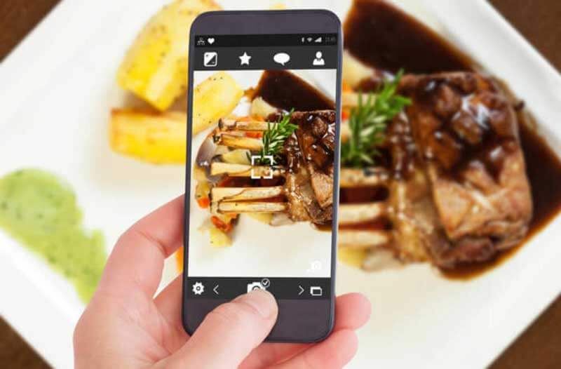 Smartphone taking photo of food