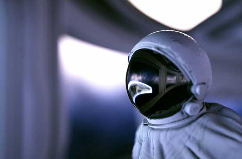 An astronaut in a spacesuit on a blurred background