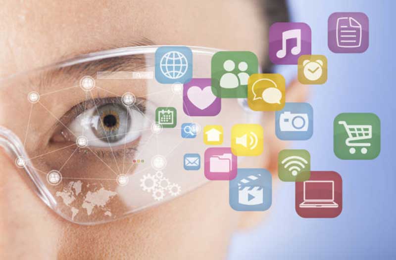 An eye with transparent glasses and various icons floating from the glasses