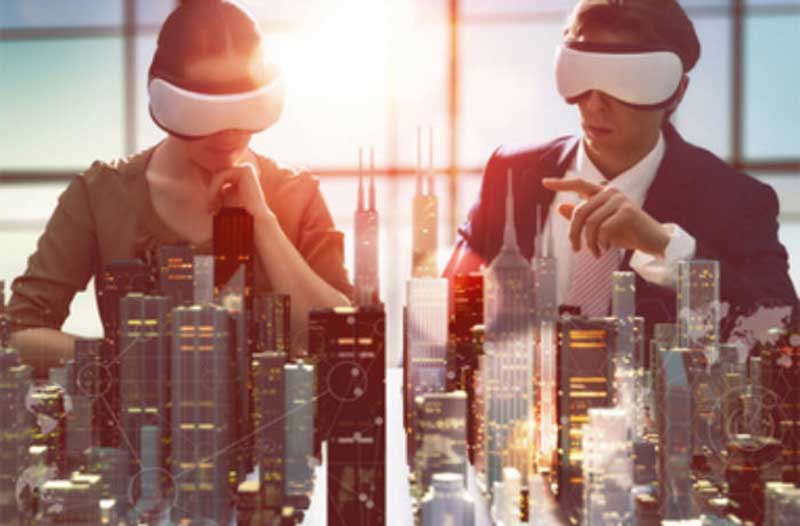 A man and a woman wearing virtual reality headsets looking at a virtual representation of a city