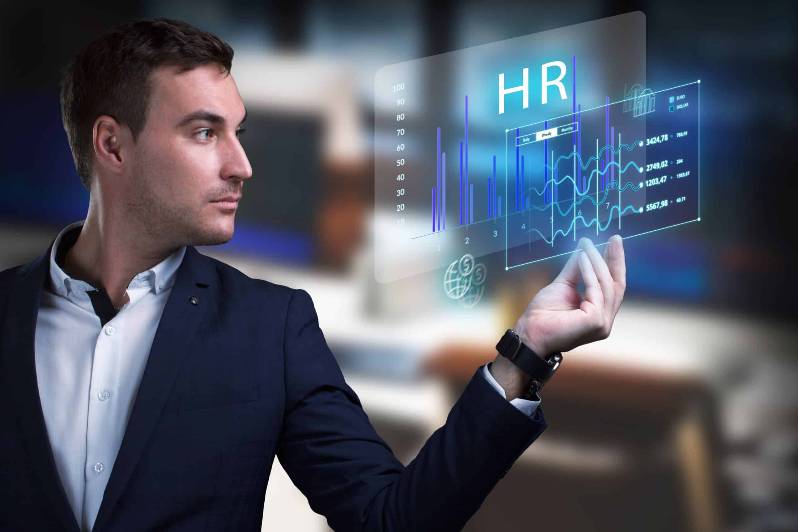 A man dressed in a dark suit is extending his hand, with HR-related infographics floating above it, symbolising modern human resource management.