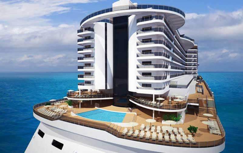Huge cruise ship with a pool deck and lounge chairs around the pool