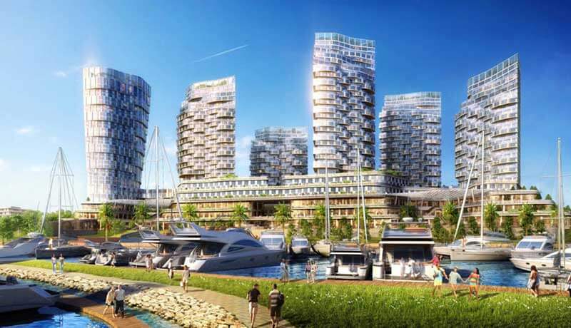 Six futuristic buildings surrounded by a marina 