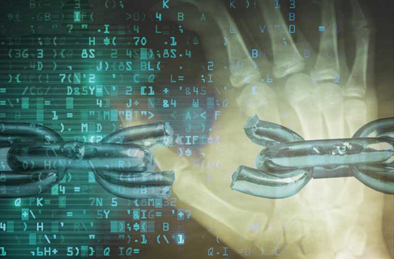 A broken metal chain with an x-ray of a human hand and lines of code in the background. 