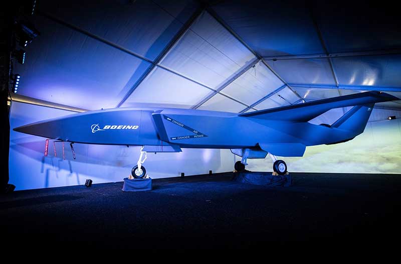 Boeing Airpower Teaming System autonomous fighter jet parked in a hangar