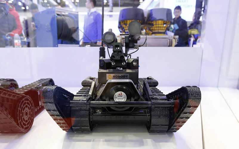 a small, black tank-like robot