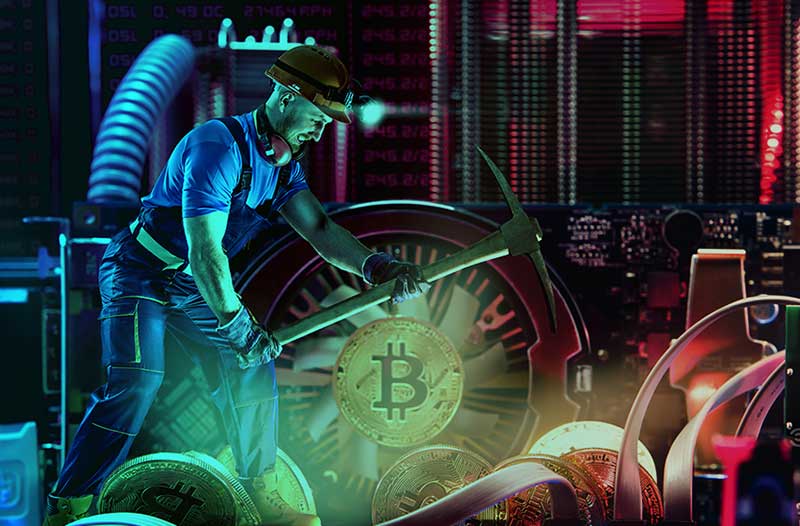 A miner surrounded by computer chips literally mining Bitcoin. 