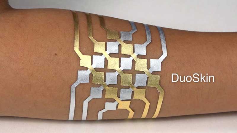 Temporary tattoo called DuoSkin on a human arm