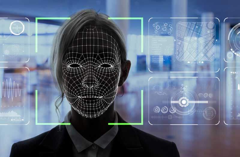 Woman with digital facial mapping lines across face