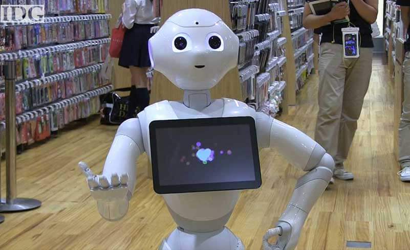 White toy-like robot with screen in tummy in shop