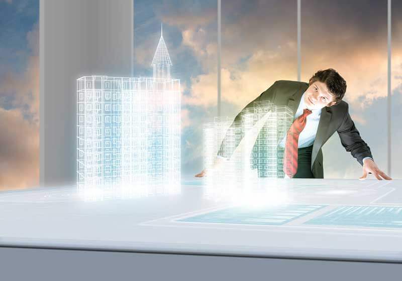 man in a suit looking at a hologram of a building