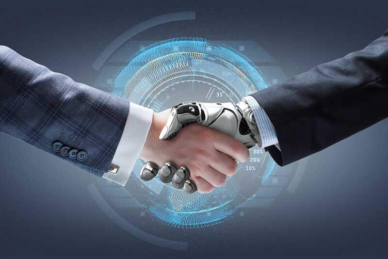 a handshake between a human hand and a robot hand