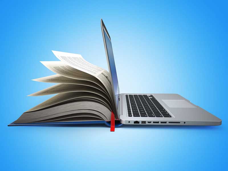 A blue background with a laptop and half a book merged into one