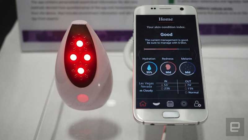 The S-Skin device with infrared LED lights connected to an app featured on a smartphone 